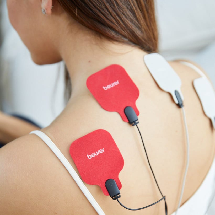 TENS/EMS device with heat function and 4 separately controllable channels with 8 electrodes